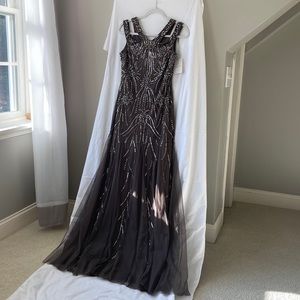 Adrianna Papell 2022 Fit and flair multiple strap beaded gown. Color: Lead